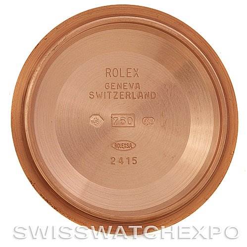 This image shows the interior case back of a Rolex President 218235RRP Men's Rose Gold Pink Dial 218235RRP Men's Rose Gold Pink Dial model, featuring engravings including the brand and model details.