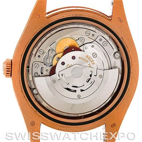 This image shows the internal mechanism of a Rolex President 218235RRP Men's Rose Gold Pink Dial 218235RRP Men's Rose Gold Pink Dial model watch from the back, highlighting its movement components.