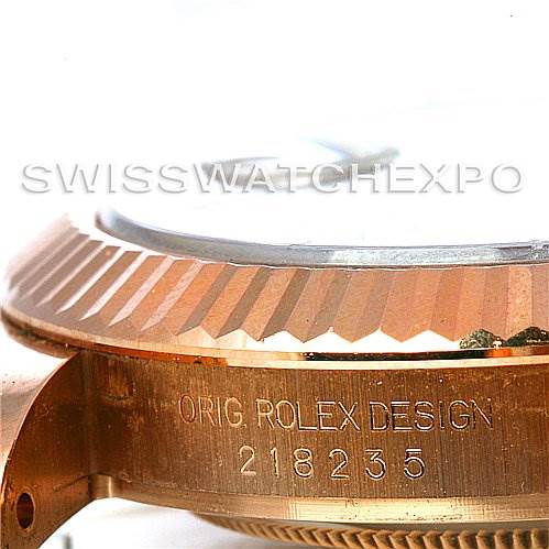 This image shows the side view of a Rolex President 218235RRP Men's Rose Gold Pink Dial 218235RRP Men's Rose Gold Pink Dial watch case, focusing on the bezel and reference number.