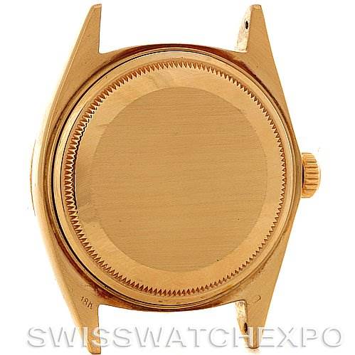 This image shows the case back and crown of a Rolex President 1807 Men's Yellow Gold Champagne Dial 1807 Men's Yellow Gold Champagne Dial model watch from a rear angle.
