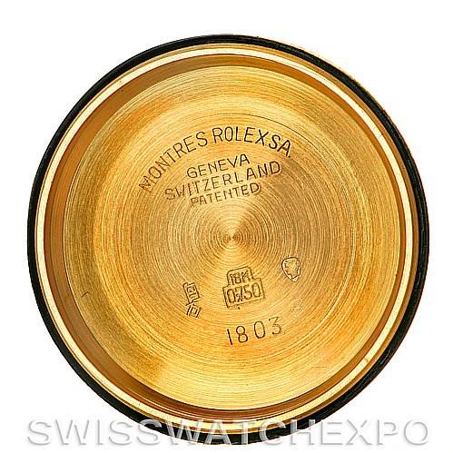 This image shows the interior case back of a Rolex President 1807 Men's Yellow Gold Champagne Dial 1807 Men's Yellow Gold Champagne Dial model, displaying the brand markings and material specifications.