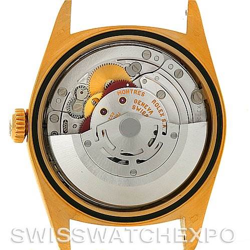 This image shows the inner mechanical movement of a Rolex President 18238 Men's Yellow Gold Mother of Pearl Dial 18238 Men's Yellow Gold Mother of Pearl Dial model watch from a back angle with the case removed.