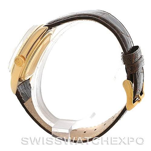 The image shows a side view of a Rolex President 1601 Men's Yellow Gold Champagne Dial 1601 Men's Yellow Gold Champagne Dial model watch, highlighting the crown, case, and brown leather strap.