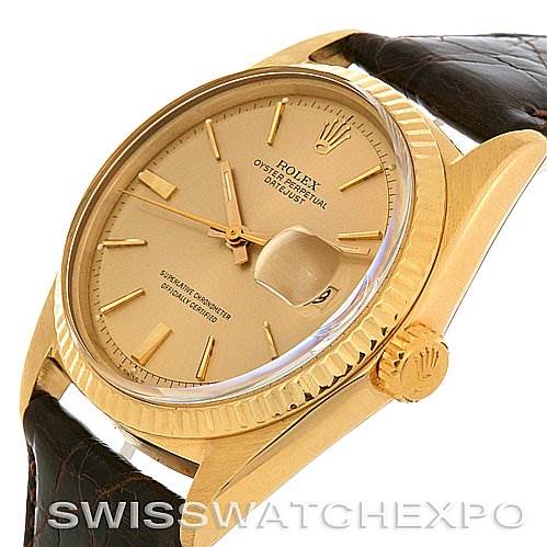 The image shows a side angle of the Rolex President 1601 Men's Yellow Gold Champagne Dial 1601 Men's Yellow Gold Champagne Dial watch, highlighting the gold case, crown, and leather strap.
