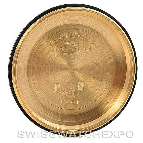 This image shows the inner case back of a Rolex President 1601 Men's Yellow Gold Champagne Dial 1601 Men's Yellow Gold Champagne Dial model watch, featuring engraved markings and serial numbers.