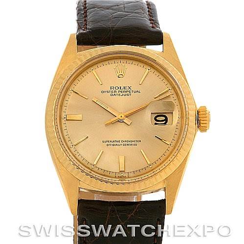 This image shows a front view of the Rolex President 1601 Men's Yellow Gold Champagne Dial 1601 Men's Yellow Gold Champagne Dial Oyster Perpetual Datejust watch, highlighting its dial, bezel, and leather strap.