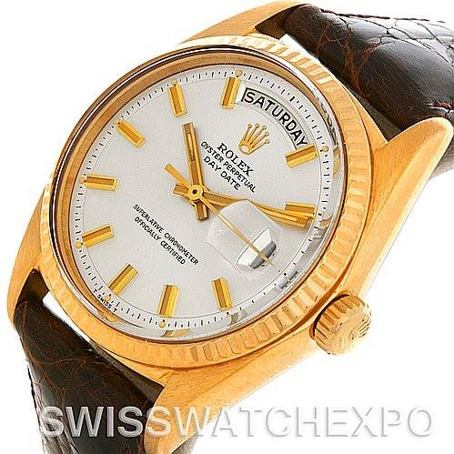 The image shows a close-up of the Rolex President 1803 Men's Yellow Gold Silver Dial 1803 Men's Yellow Gold Silver Dial model watch, displaying the face, crown, and part of the leather strap.