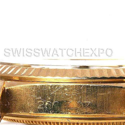 The image shows a close-up of the side of a Rolex President 1803 Men's Yellow Gold Silver Dial 1803 Men's Yellow Gold Silver Dial watch, highlighting the fluted bezel and part of the case.