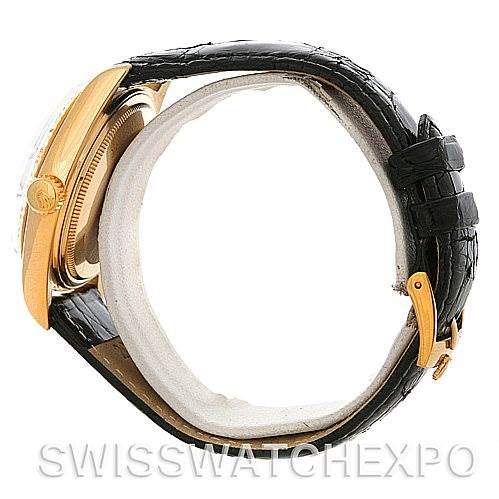 Side view of a Rolex President 1803 Men's Yellow Gold White Dial 1803 Men's Yellow Gold White Dial model watch showing the gold case, crown, and black leather strap with buckle.