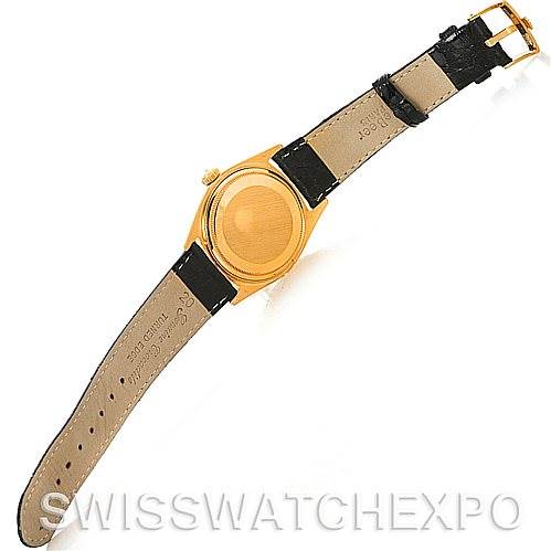 This image shows the back of the Rolex President 1803 Men's Yellow Gold White Dial 1803 Men's Yellow Gold White Dial watch with its leather strap fully extended.