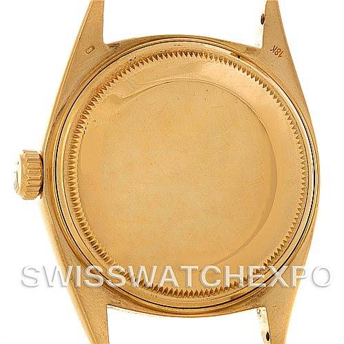 The image shows the caseback and part of the lugs of a Rolex President 1803 Men's Yellow Gold Champagne Dial 1803 Men's Yellow Gold Champagne Dial model watch, viewed from the back.