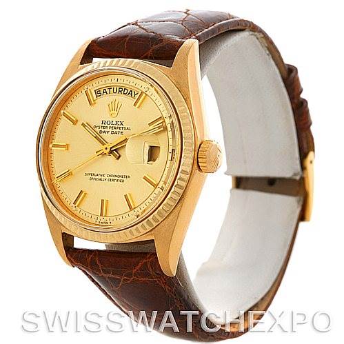 The image shows a Rolex President 1803 Men's Yellow Gold Champagne Dial 1803 Men's Yellow Gold Champagne Dial model watch with a gold dial, day-date display, and brown leather strap, viewed from an angled side perspective.