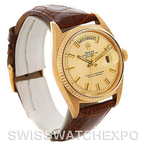 The image shows a gold Rolex President 1803 Men's Yellow Gold Champagne Dial 1803 Men's Yellow Gold Champagne Dial watch from an angled side view, highlighting the dial, crown, and leather strap.