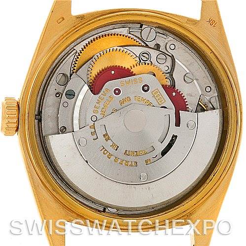 This image shows the internal mechanism of a Rolex President 1803 Men's Yellow Gold Champagne Dial 1803 Men's Yellow Gold Champagne Dial model watch, viewed from the back case, highlighting its gears and rotor.