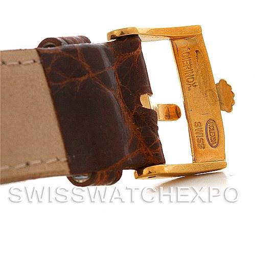 The image shows a close-up angle of the buckle and part of the leather strap of a Rolex President 1803 Men's Yellow Gold Champagne Dial 1803 Men's Yellow Gold Champagne Dial model.