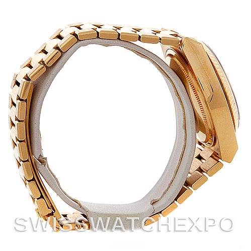 The Rolex Oysterquartz 19018 Men's Yellow Gold Black Dial 19018 Men's Yellow Gold Black Dial model watch is shown from a side angle, highlighting the bracelet and case.