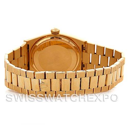 The image shows the back view of a Rolex Oysterquartz 19018 Men's Yellow Gold Black Dial 19018 Men's Yellow Gold Black Dial watch, highlighting the bracelet and case back.