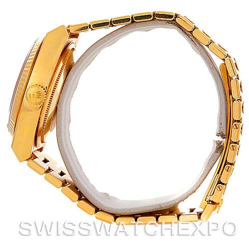 The image shows a side profile view of a Rolex Oysterquartz 19018 Men's Yellow Gold Black Dial 19018 Men's Yellow Gold Black Dial watch, highlighting its case, bracelet, and crown.