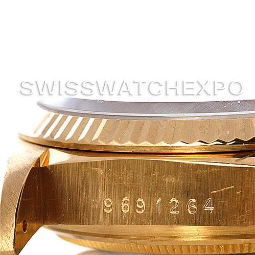 The image shows the side view of a Rolex President 18038 Men's Yellow Gold Black Dial 18038 Men's Yellow Gold Black Dial model watch, highlighting the serial number and part of the fluted bezel.