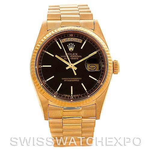 The image shows a front view of a Rolex President 18038 Men's Yellow Gold Black Dial 18038 Men's Yellow Gold Black Dial model watch, highlighting the black dial, day-date display, and gold bracelet.