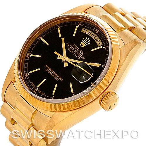 This image shows a Rolex President 18038 Men's Yellow Gold Black Dial 18038 Men's Yellow Gold Black Dial model watch at an angled view, highlighting the black dial, day-date window, fluted bezel, and gold bracelet.