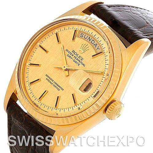 This image shows a Rolex President 1803 Men's Yellow Gold Champagne Dial 1803 Men's Yellow Gold Champagne Dial model watch from an angled top view, featuring the face, crown, and part of the strap.