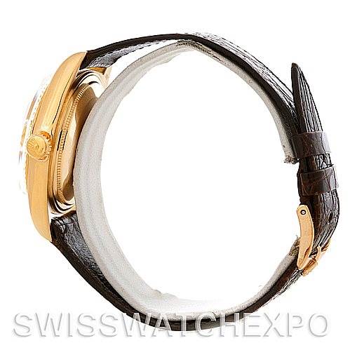 The Rolex President 1803 Men's Yellow Gold Champagne Dial 1803 Men's Yellow Gold Champagne Dial watch is shown from the side, highlighting the crown, case, and leather strap with a buckle.