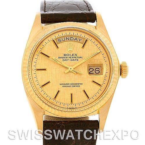 This image shows a frontal view of a Rolex President 1803 Men's Yellow Gold Champagne Dial 1803 Men's Yellow Gold Champagne Dial model, highlighting the dial, date, and day indicators, along with the leather strap.