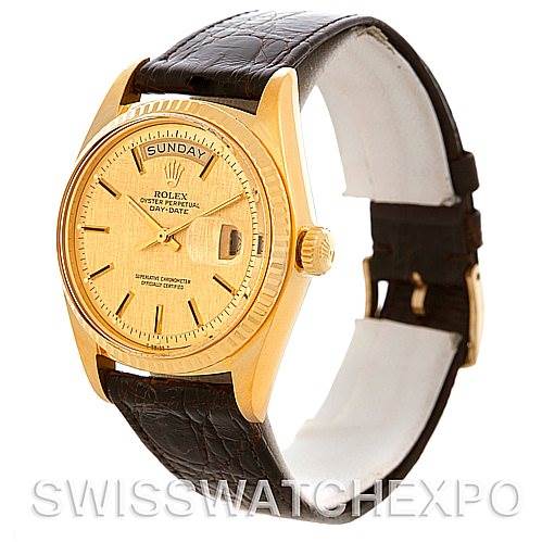 This image shows a side view angle of a gold Rolex President 1803 Men's Yellow Gold Champagne Dial 1803 Men's Yellow Gold Champagne Dial Day-Date watch with a black leather strap.
