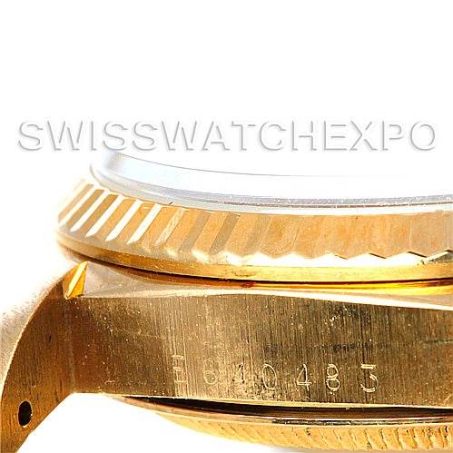 This image shows a close-up of the side view of a Rolex President 16238 Men's Yellow Gold White Dial 16238 Men's Yellow Gold White Dial model, highlighting the serial number and the fluted bezel.