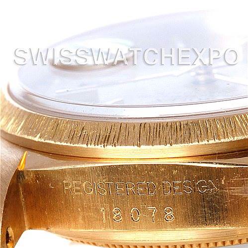 This image shows a close-up angle of the side case and bezel of a Rolex President 18078 Men's Yellow Gold Champagne Dial 18078 Men's Yellow Gold Champagne Dial model watch.