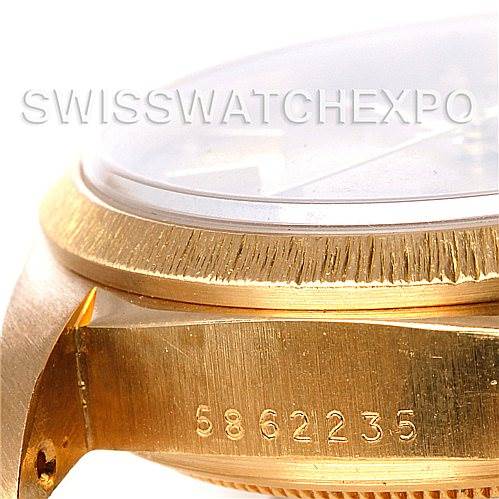 The image shows a close-up side view of the gold casing of the Rolex President 18078 Men's Yellow Gold Champagne Dial 18078 Men's Yellow Gold Champagne Dial model with visible serial numbers.