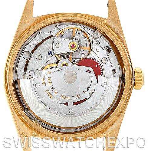The image shows the interior movement mechanism of a Rolex President 18038 Men's Yellow Gold White Dial 18038 Men's Yellow Gold White Dial model watch from a back angle.