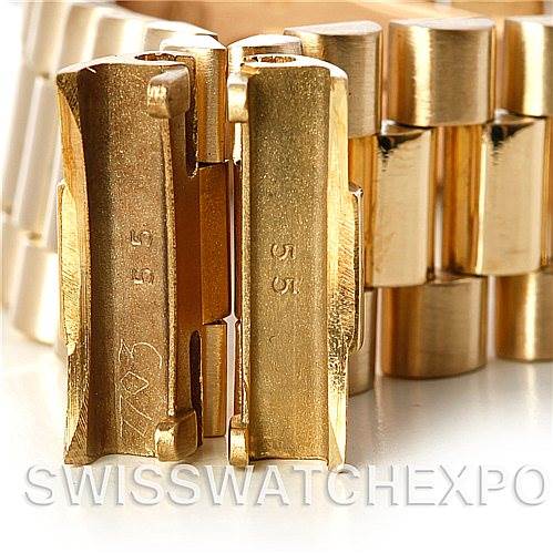This image shows a close-up of the clasp and links of a Rolex President 18038 Men's Yellow Gold White Dial 18038 Men's Yellow Gold White Dial model watch bracelet.