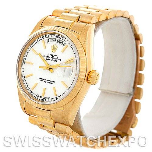 This image shows a Rolex President 18038 Men's Yellow Gold White Dial 18038 Men's Yellow Gold White Dial model watch at an angle, highlighting the face, bezel, crown, and bracelet.