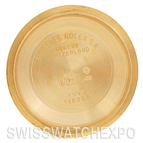 This is the inner case back of a Rolex President 118238 Men's Yellow Gold White Dial 118238 Men's Yellow Gold White Dial model watch, showing branding and identifying engravings.