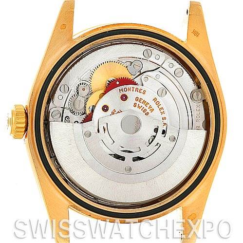 This image shows the back view of the Rolex President 118238 Men's Yellow Gold White Dial 118238 Men's Yellow Gold White Dial model, exposing its intricate movement and internal mechanics.