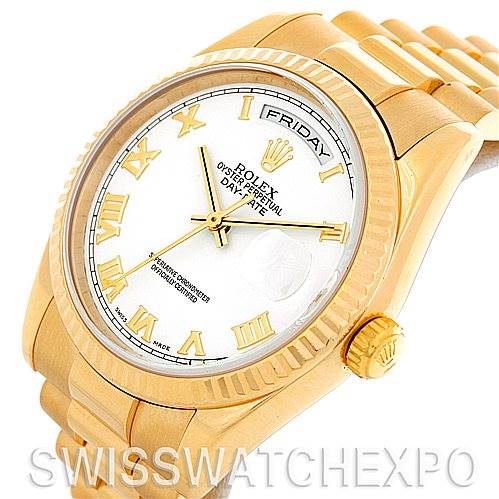 This image shows a Rolex President 118238 Men's Yellow Gold White Dial 118238 Men's Yellow Gold White Dial model watch from an angled front view, highlighting the dial, crown, case, and part of the bracelet.