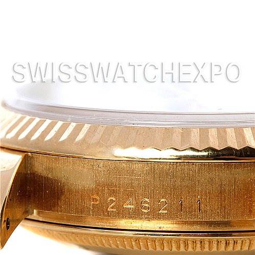 The image shows a close-up of the side and bezel of a Rolex President 118238 Men's Yellow Gold White Dial 118238 Men's Yellow Gold White Dial model watch, highlighting its serial number.