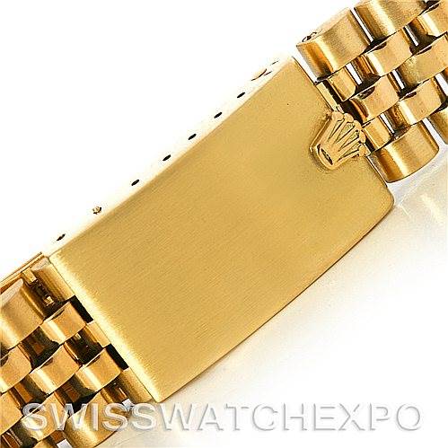 This image shows a close-up of the clasp of a Rolex President   model watch.