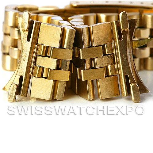 This close-up image shows the clasp and bracelet links of a Rolex President   model watch.