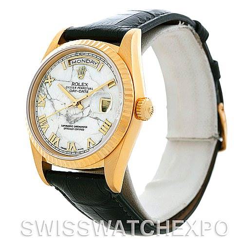 The image shows a Rolex President 18238 Men's Yellow Gold Grey Dial 18238 Men's Yellow Gold Grey Dial Day-Date watch at an angle displaying its face, bezel, crown, and leather strap.