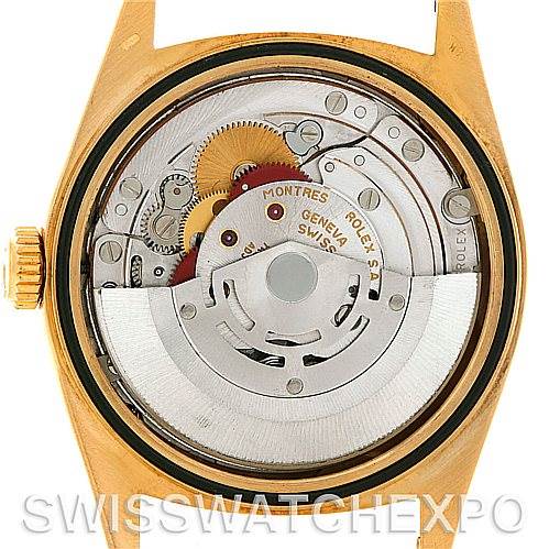 The image shows the back view of a Rolex President 18248 Men's Yellow Gold Black Dial 18248 Men's Yellow Gold Black Dial model watch, highlighting its internal mechanism.