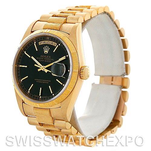 This image shows a Rolex President 18248 Men's Yellow Gold Black Dial 18248 Men's Yellow Gold Black Dial model watch at a three-quarter angle, highlighting the gold band, black dial, and day-date display.