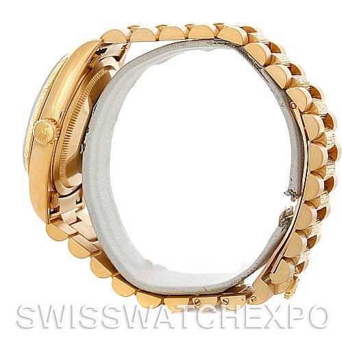 This image shows a gold Rolex President 18248 Men's Yellow Gold Black Dial 18248 Men's Yellow Gold Black Dial model watch from a side angle, highlighting the bracelet and the case side.