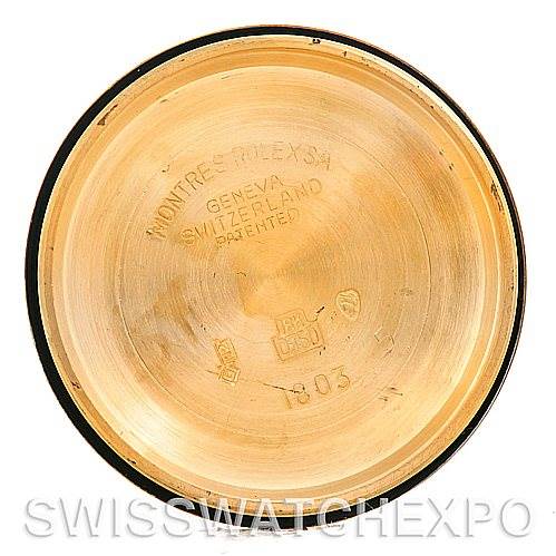 This image shows the inside back casing of a Rolex President 1803 Men's Yellow Gold Champagne Dial 1803 Men's Yellow Gold Champagne Dial model watch, engraved with brand details and manufacturing information.