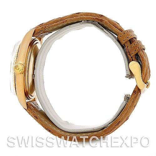 The image shows a side view of a Rolex President 1803 Men's Yellow Gold Champagne Dial 1803 Men's Yellow Gold Champagne Dial model watch with a brown leather strap and gold case.