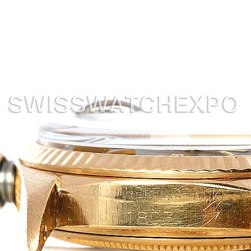 A side view of the Rolex President 1803 Men's Yellow Gold Blue Dial 1803 Men's Yellow Gold Blue Dial model, focusing on the bezel, crown, and a part of the case with engravings visible.