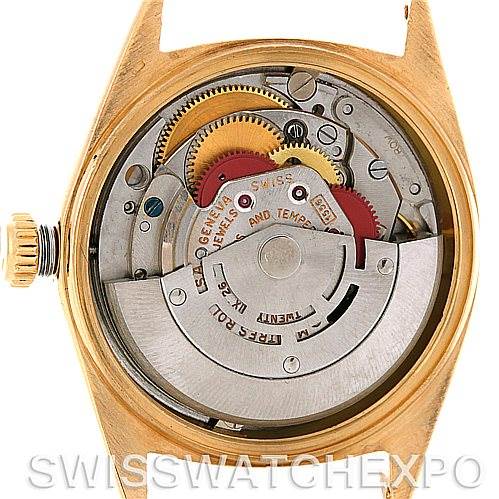 The image shows the internal mechanical movement of a Rolex President 1803 Men's Yellow Gold Blue Dial 1803 Men's Yellow Gold Blue Dial watch viewed from the back, exposing the gears and rotor.