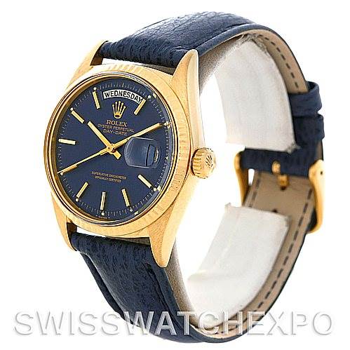 This image shows a Rolex President 1803 Men's Yellow Gold Blue Dial 1803 Men's Yellow Gold Blue Dial model watch in a three-quarter angle, highlighting its gold case, blue dial, and leather strap.